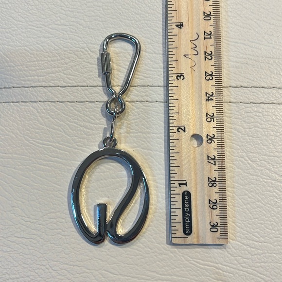 Silver-tone St. John Keychain. - Picture 2 of 2